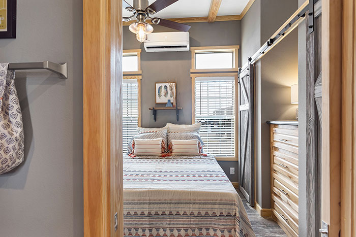 bright bedroom with stained wood details